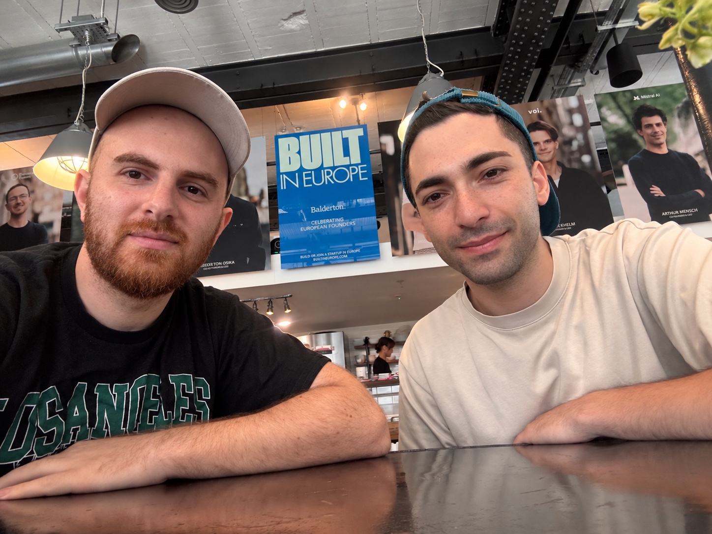 Vazgen and Arman together in front of the Built in Europe sign